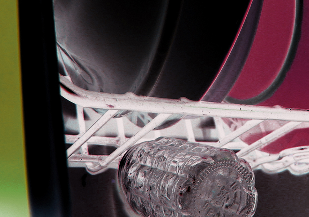Red Curves in the Kitchen by Catherine Rutgers - Color-modified detail of a photo by the artist, dishes drying on the sink